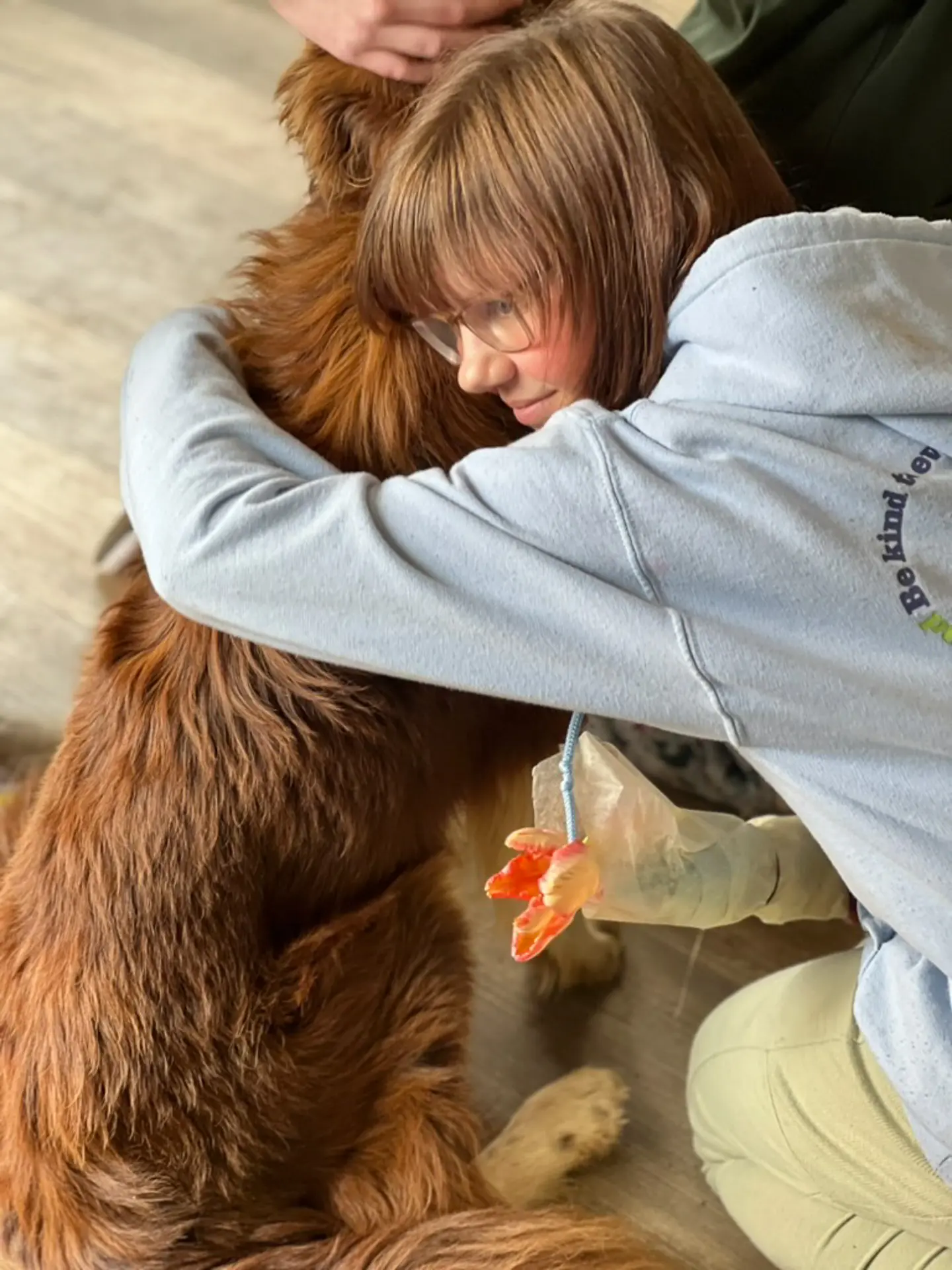 460107F9-Dog-Camper_FORT-Animals - The Ryan Bartel Foundation A camper bonding with a dog at a FORT Animals program session