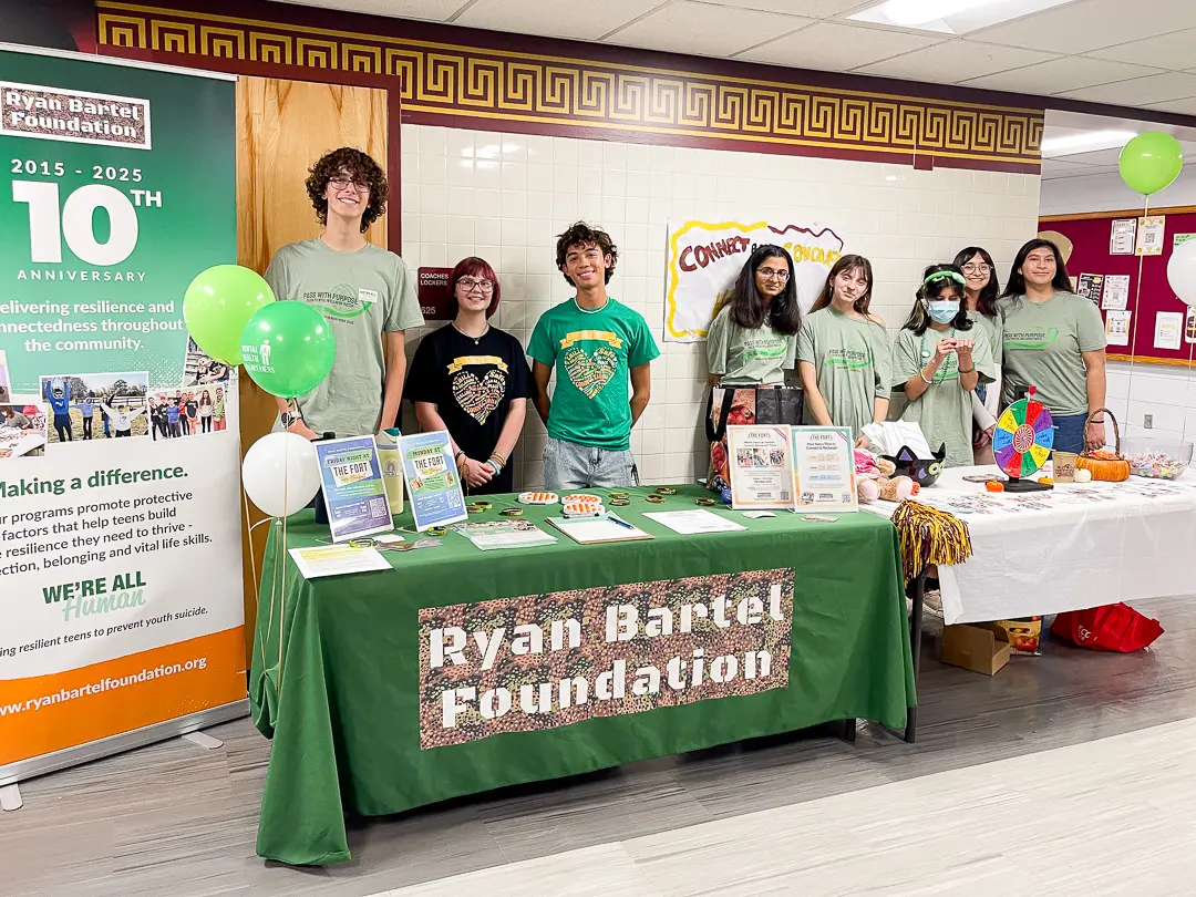 Students and a Ryan Bartel Foundation ambassador at a high school mental health awareness event