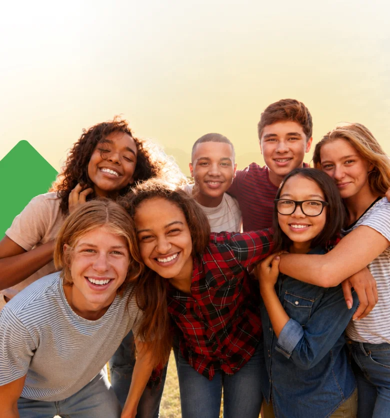 home-hero-bg Group of smiling teens outdoors